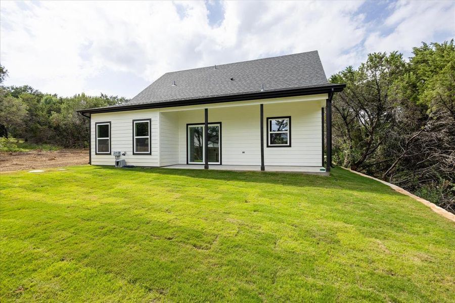 Exterior details and patio area of a home in , Granbury (Image 25).