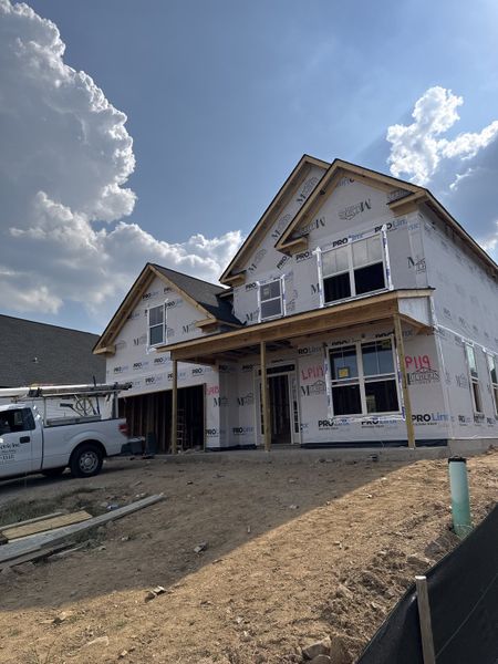 Front exterior of a new home in Crawford Creek, Grovetown, GA, highlighting curb appeal (Image 14). Front exterior of a new home in Crawford Creek, Grovetown, GA, highlighting curb appeal (Image 14).