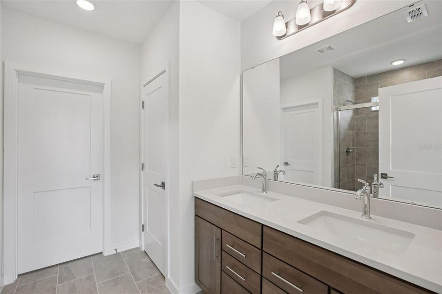 Furnished interior view inside a new home in Grasslands West, Lakeland (Image 11).
