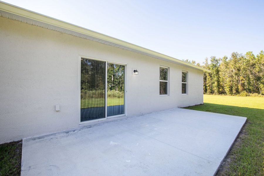 Exterior details and patio area of a home in Marion Oaks, Ocala (Image 3). Exterior details and patio area of a home in Marion Oaks, Ocala (Image 3).