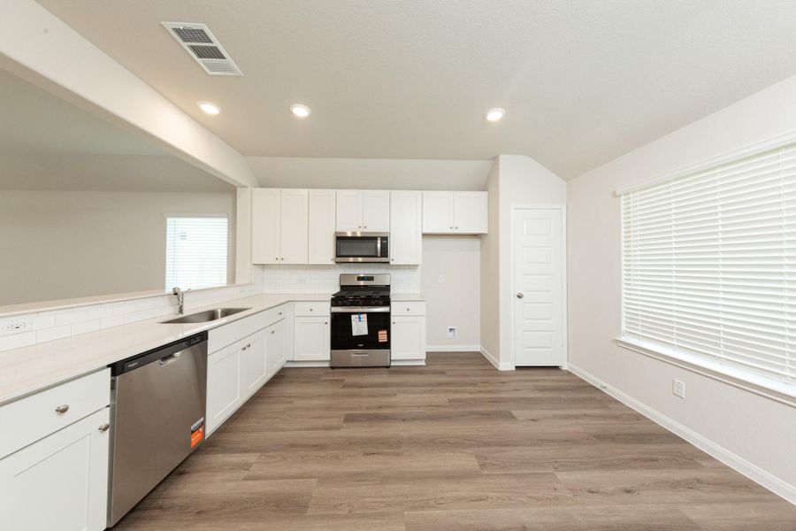 Furnished interior view inside a new home in Townsend Reserve, Splendora (Image 5).