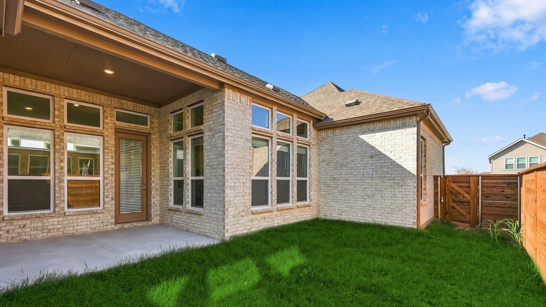 Exterior details and patio area of a home in Solterra Texas, Mesquite (Image 21).