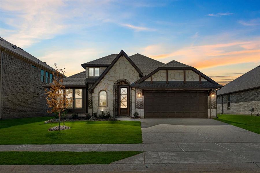 Front exterior of a new home in Woodstone, Providence Village, TX, highlighting curb appeal (Image 1). Front exterior of a new home in Woodstone, Providence Village, TX, highlighting curb appeal (Image 1).