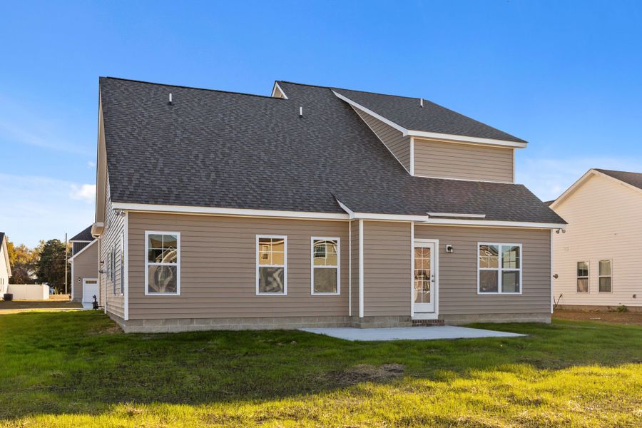Exterior details and patio area of a home in Arbor Hills South II, Greenville (Image 25).