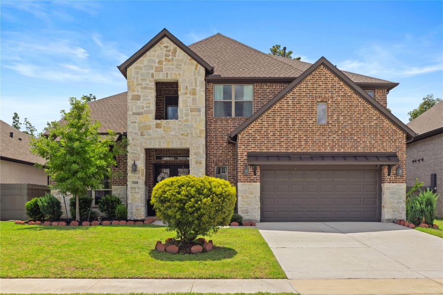 Front exterior of a new home in , Conroe, TX, highlighting curb appeal (Image 21). Front exterior of a new home in , Conroe, TX, highlighting curb appeal (Image 21).