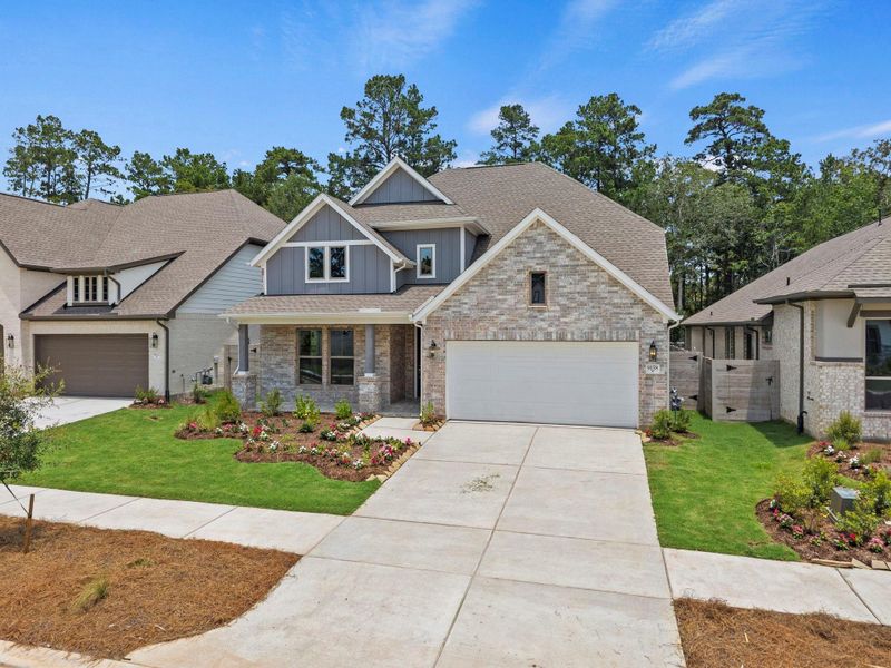 Front exterior of a new home in Two Step Farm, Montgomery, TX, highlighting curb appeal (Image 21). Front exterior of a new home in Two Step Farm, Montgomery, TX, highlighting curb appeal (Image 21).