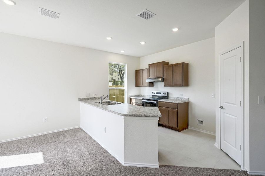 Furnished interior view inside a new home in Creekside at Estancia, Austin (Image 5).