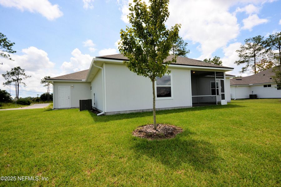 Front exterior of a new home in , Jacksonville, FL, highlighting curb appeal (Image 21).