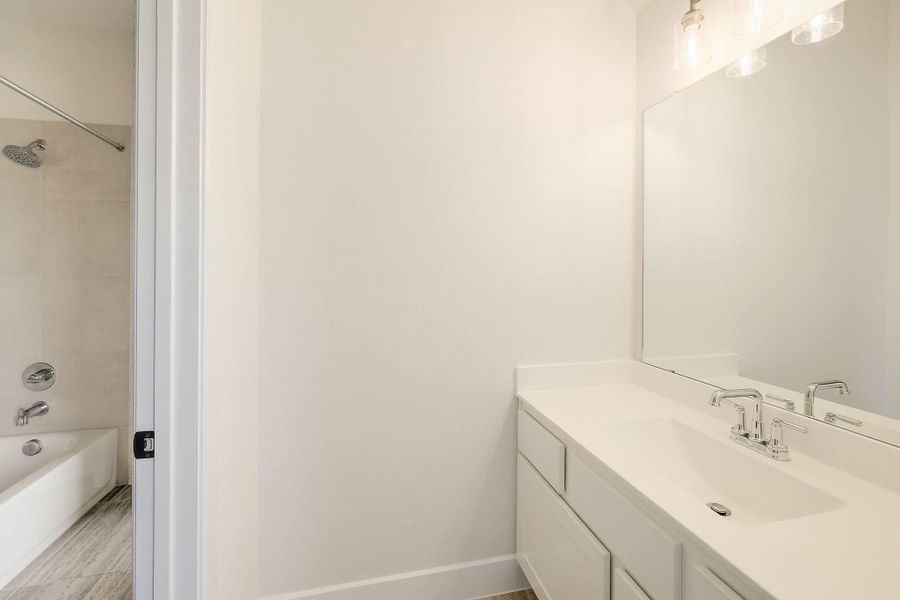 Furnished interior view inside a new home in Parmer Ranch - 60', Georgetown (Image 9).