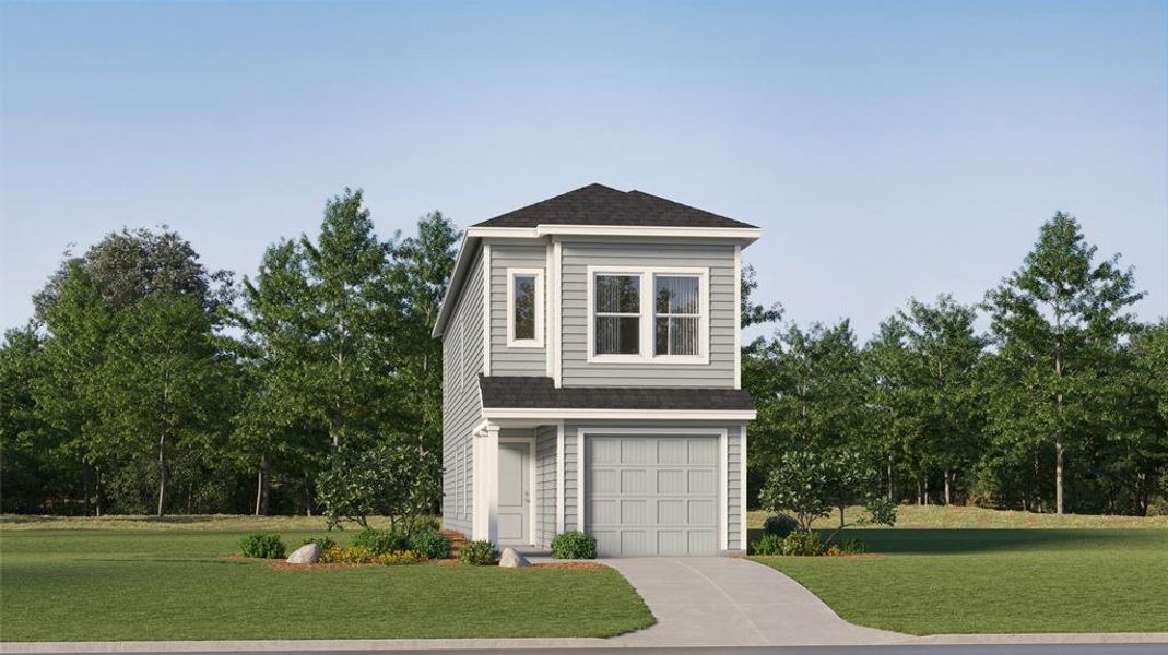 View of front of house with a garage and a front yard