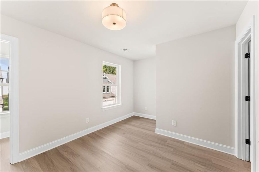 Spacious, unfurnished interior of a new home in The Village at Shallowford, Kennesaw (Image 21).