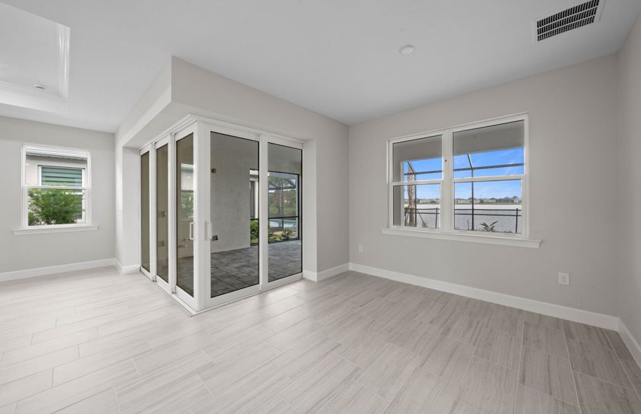 Spacious, unfurnished interior of a new home in Del Webb Oak Creek, North Fort Myers (Image 34).