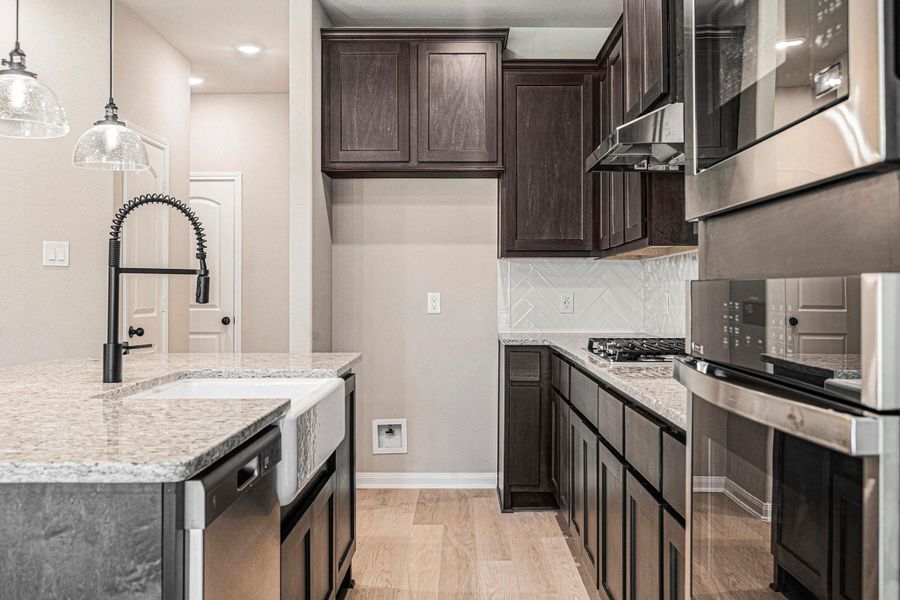 Furnished interior view inside a new home in Deer Pines, Conroe (Image 8).