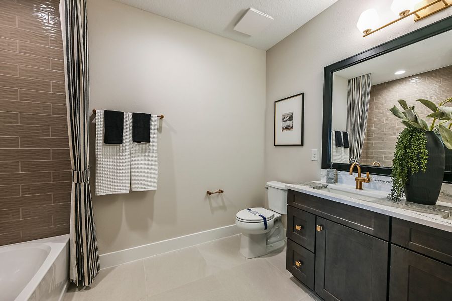 Representative furnished interior of a home built from the Key West II by Homes by WestBay in Oakfield, Parrish (Image 17).