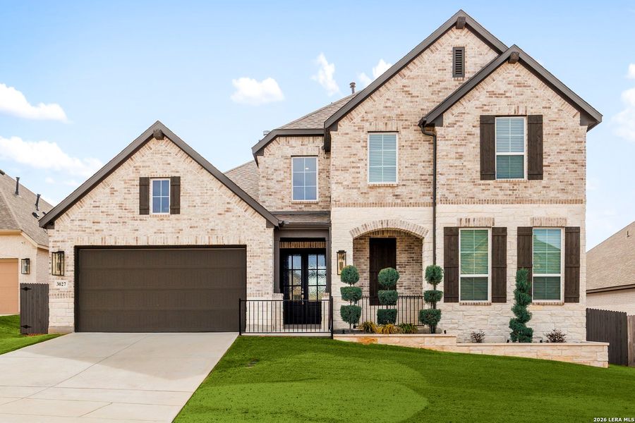 Front exterior of a new home in Ventana, Bulverde, TX, highlighting curb appeal (Image 26).