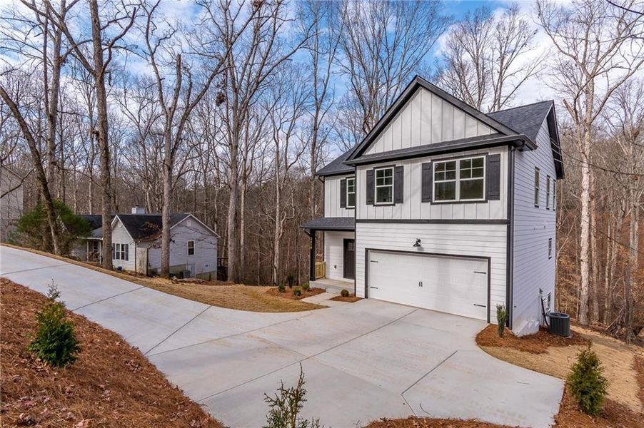 Front exterior of a new home in , Gainesville, GA, highlighting curb appeal (Image 18).