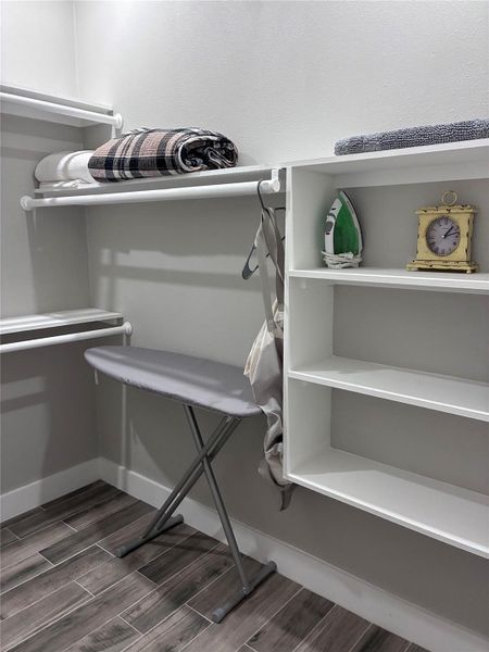 Master Bed Walk in closet featuring Built Ins