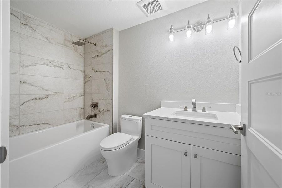 Furnished interior view inside a new home in , Madeira Beach (Image 7).