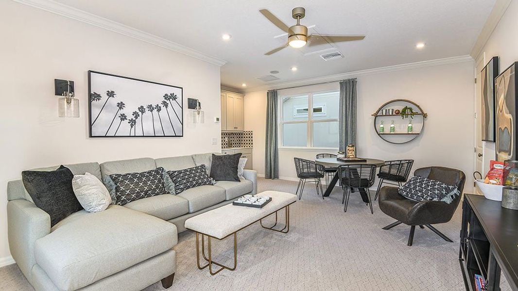Representative furnished interior of a home built from the Newberry by Taylor Morrison in Harvest at Ovation, Winter Garden (Image 14).
