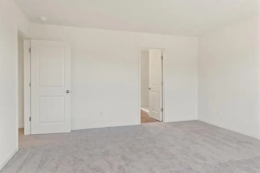 Spacious, unfurnished interior of a new home in The Ridge at Twin Rivers, Covington (Image 20).