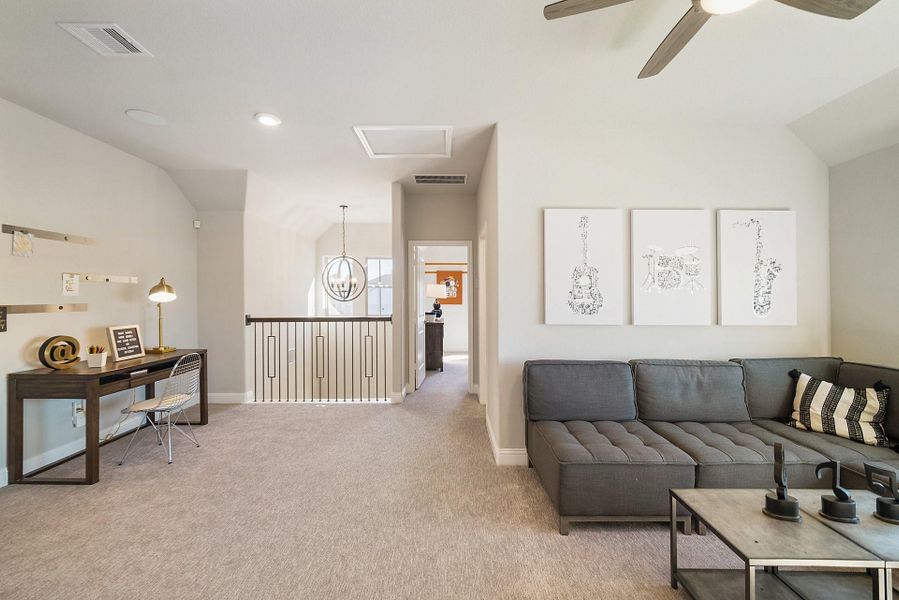 Furnished interior view inside a new home in Ellwood, Iowa Colony (Image 3).