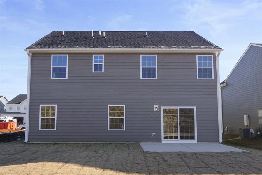 Exterior details and patio area of a home in Canterbrook Farms 2-Story, Fountain Inn (Image 2).