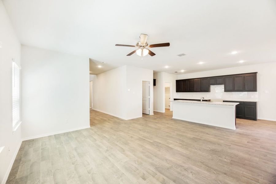 Representative exterior photo of a completed home built from the Lockhart by Impression Homes in Heartland, Heartland, TX (Image 12).