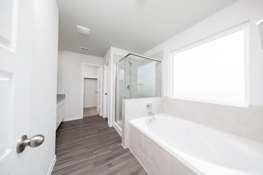 Furnished interior view inside a new home in Granger Pines, Conroe (Image 7).