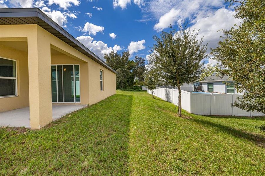 Exterior details and patio area of a home in , Poinciana (Image 2). Exterior details and patio area of a home in , Poinciana (Image 2).