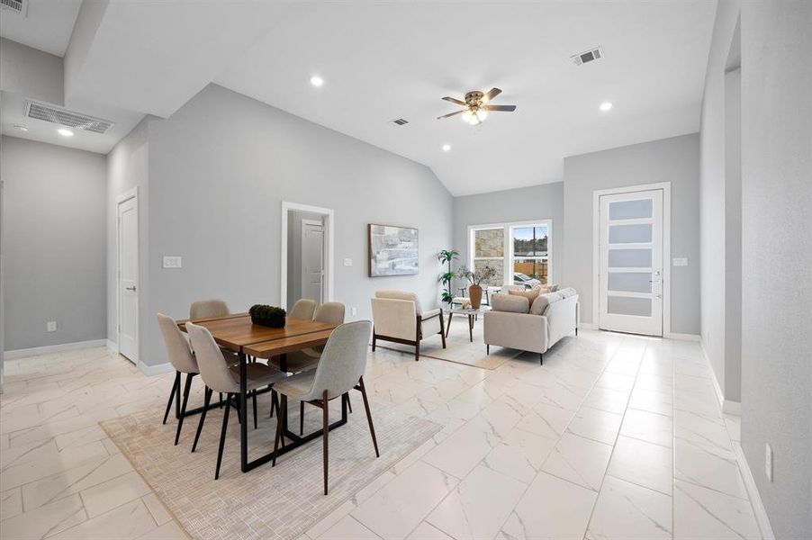 Spacious open-concept layout with high ceilings and tile flooring throughout—no carpet!