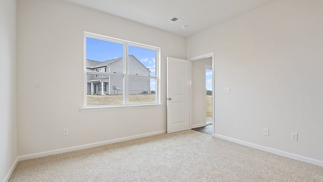 Representative unfurnished interior of a home built from the Macon by D.R. Horton in Lakestone, Woodruff (Image 17).
