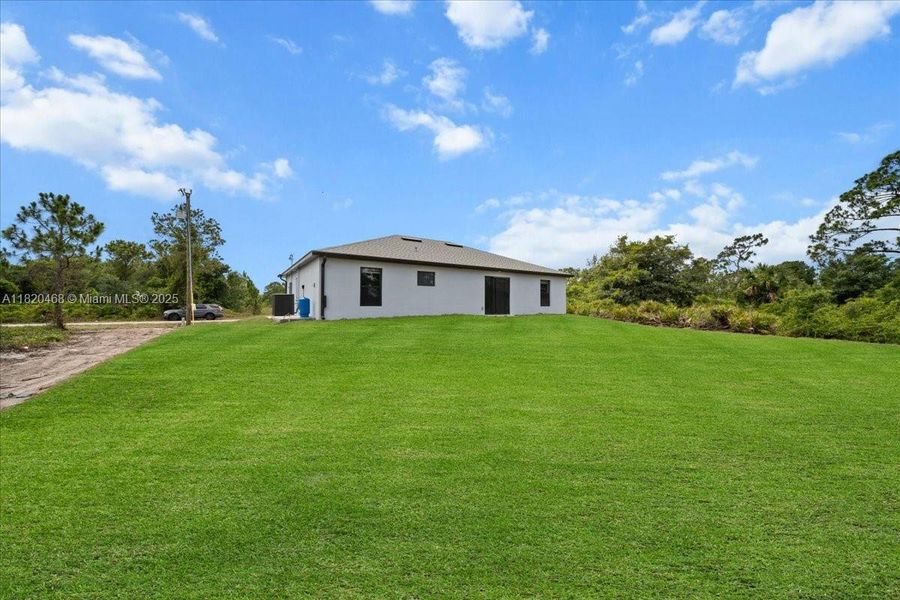 Exterior details and patio area of a home in , Lehigh Acres (Image 16).