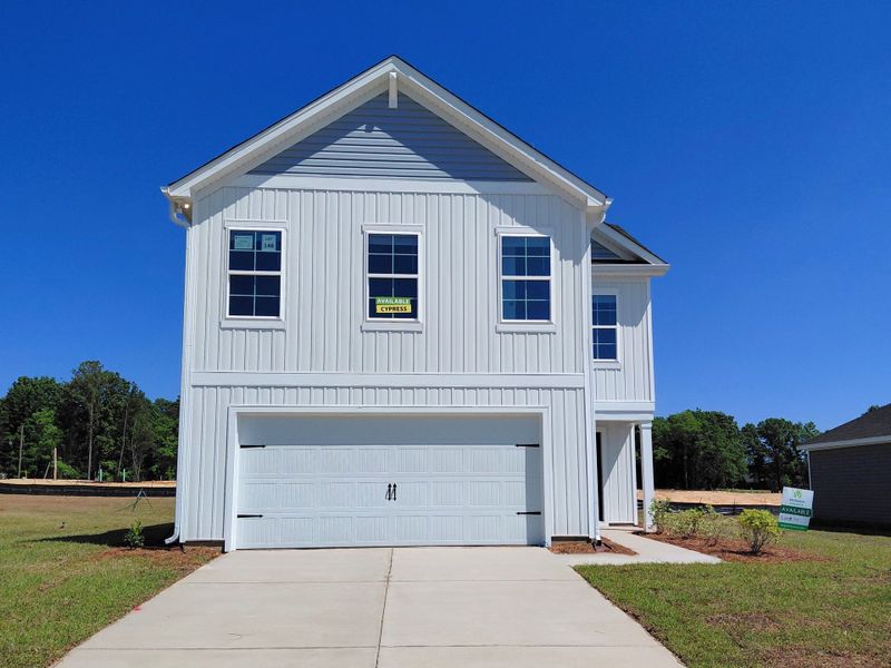 Front exterior of a new home in Reserve at Mill Creek, Columbia, SC, highlighting curb appeal (Image 2). Front exterior of a new home in Reserve at Mill Creek, Columbia, SC, highlighting curb appeal (Image 2).
