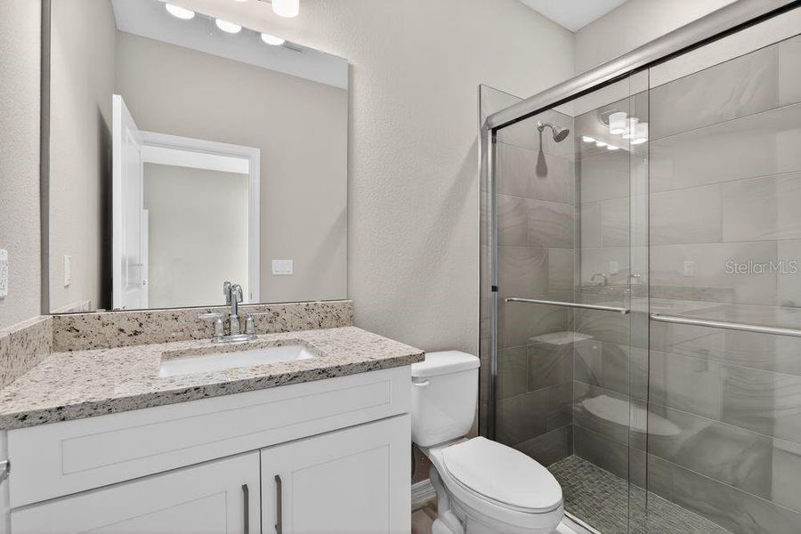 Furnished interior view inside a new home in Ardisia Park, New Smyrna Beach (Image 13).