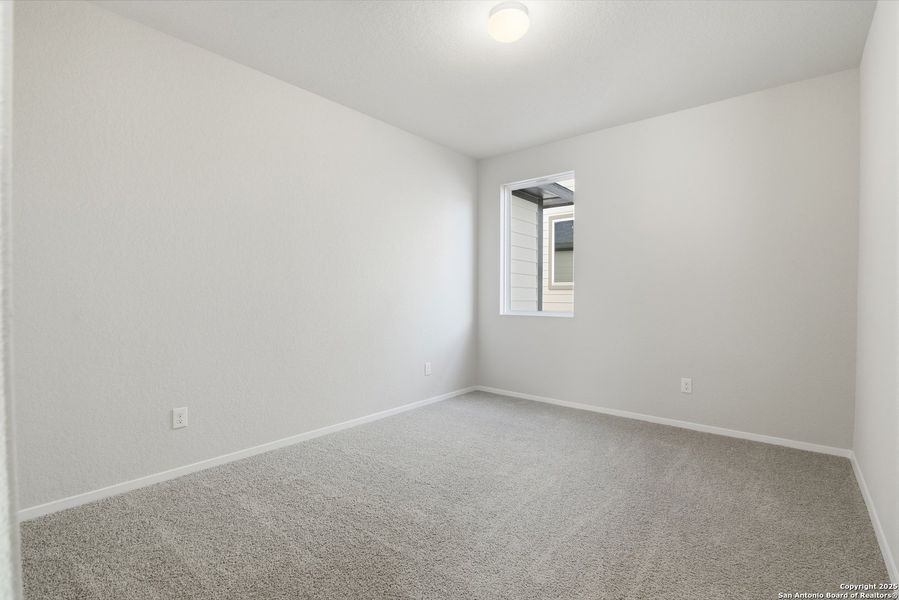 Spacious, unfurnished interior of a new home in Hunters Ranch, San Antonio (Image 24).