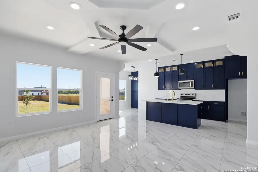 Furnished interior view inside a new home in , Atascosa (Image 7).