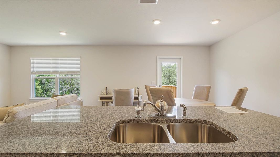 Representative furnished interior of a home built from the Aldridge by D.R. Horton in Sunny Hills, Chipley (Image 11).