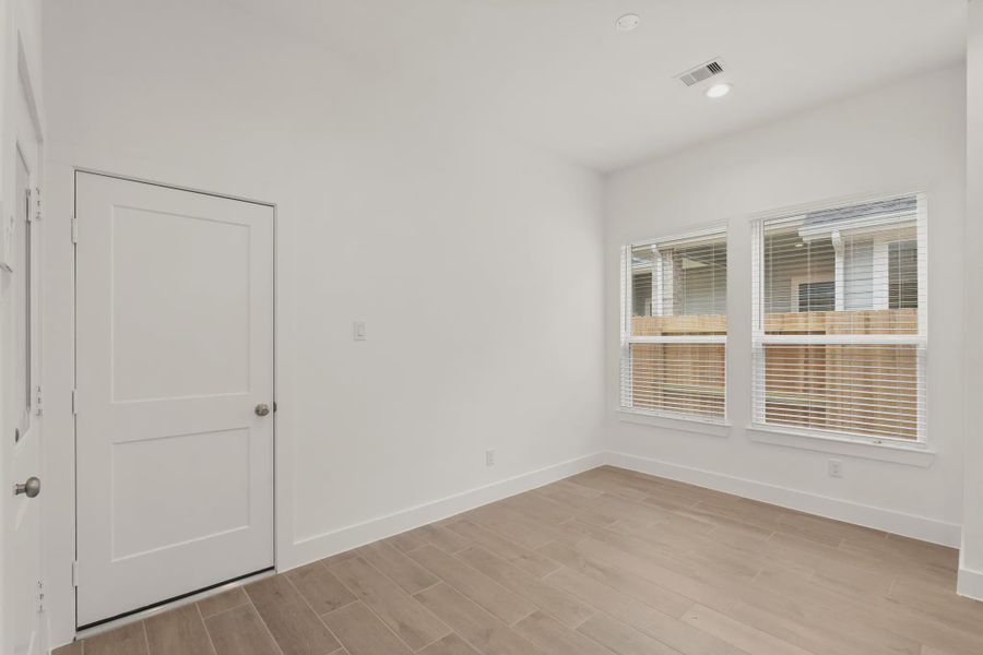 Representative unfurnished interior of a home built from the St Andrews by Chesmar Homes in Riceland Alley Loads, Mont Belvieu (Image 61).