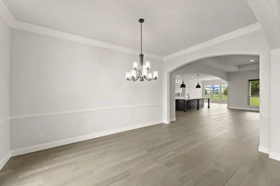 Representative unfurnished interior of a home built from the Southport by Windsor Homes in Ridge Pointe Estates, McLendon-Chisholm (Image 18).