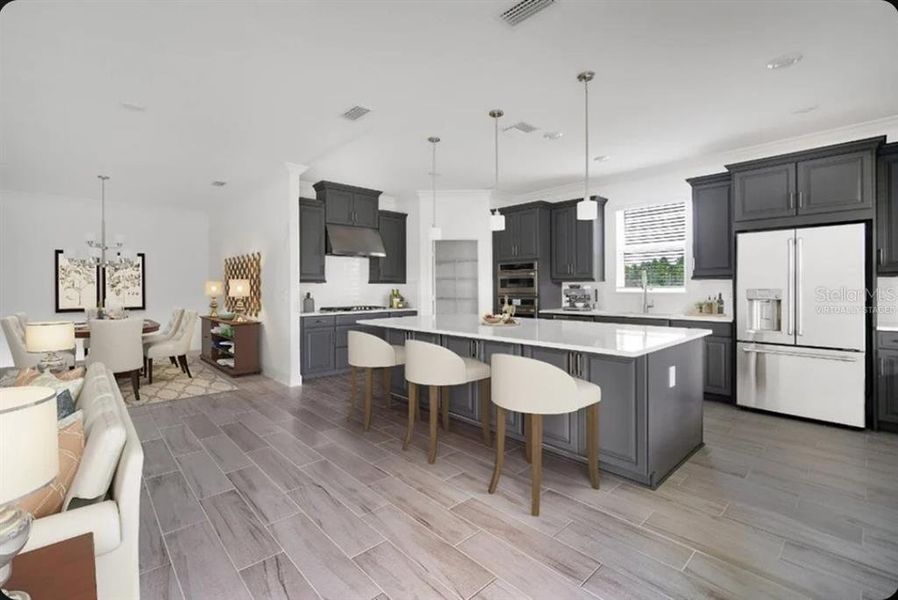 Furnished interior view inside a new home in Harvest at Ovation, Winter Garden (Image 4). Furnished interior view inside a new home in Harvest at Ovation, Winter Garden (Image 4).