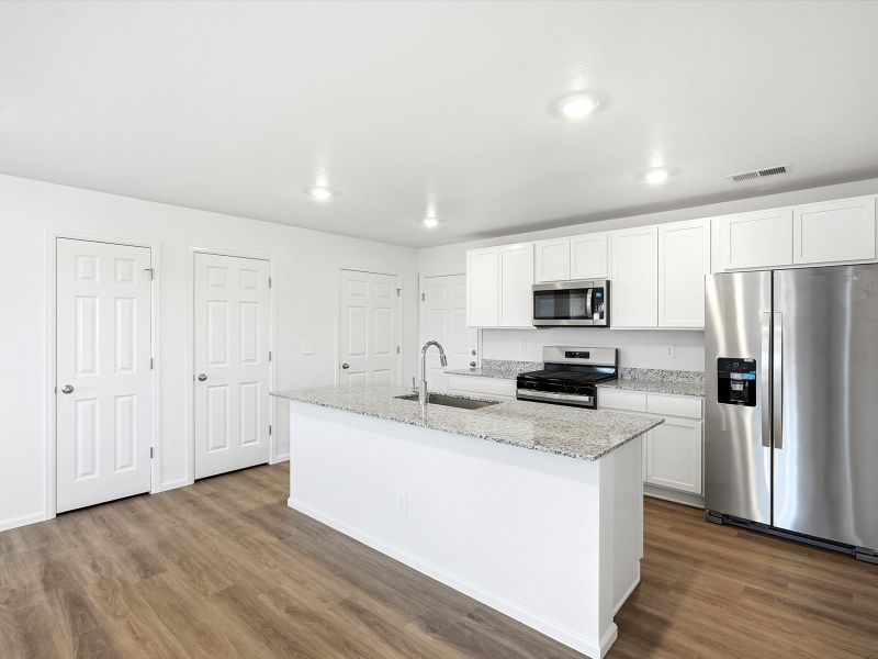 Furnished interior view inside a new home in Skyview at High Point, Aurora (Image 3).