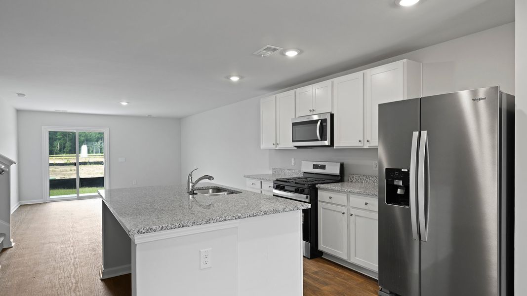 Representative furnished interior of a home built from the MURRAY TH by D.R. Horton in Pine Hills Townhomes at Cane Bay, Summerville (Image 8).