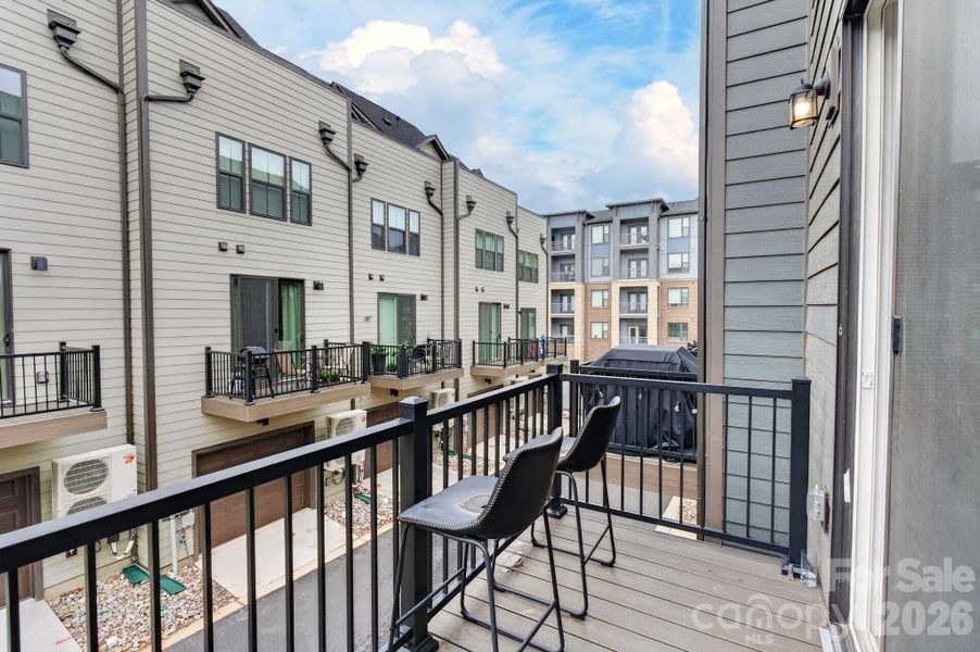 Exterior details and patio area of a home in Southrail Station, Charlotte (Image 22).