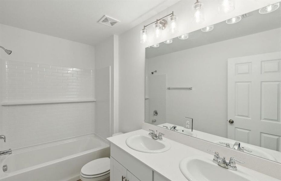 Upgraded secondary bathroom*real home pictured