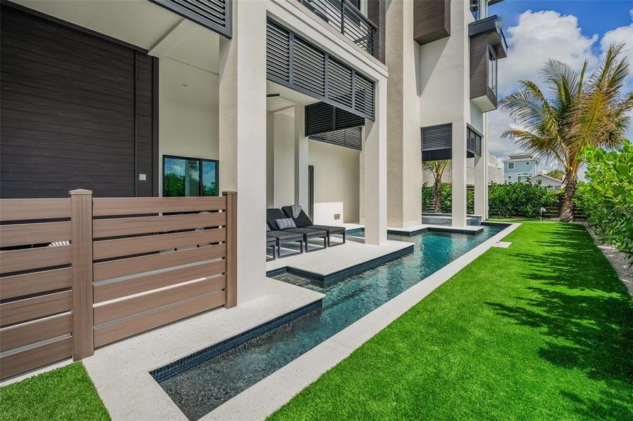 Exterior details and patio area of a home in , Bradenton Beach (Image 28).
