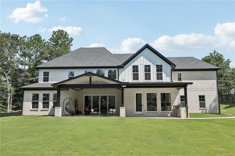 Front exterior of a new home in , Hoschton, GA, highlighting curb appeal (Image 33). Front exterior of a new home in , Hoschton, GA, highlighting curb appeal (Image 33).