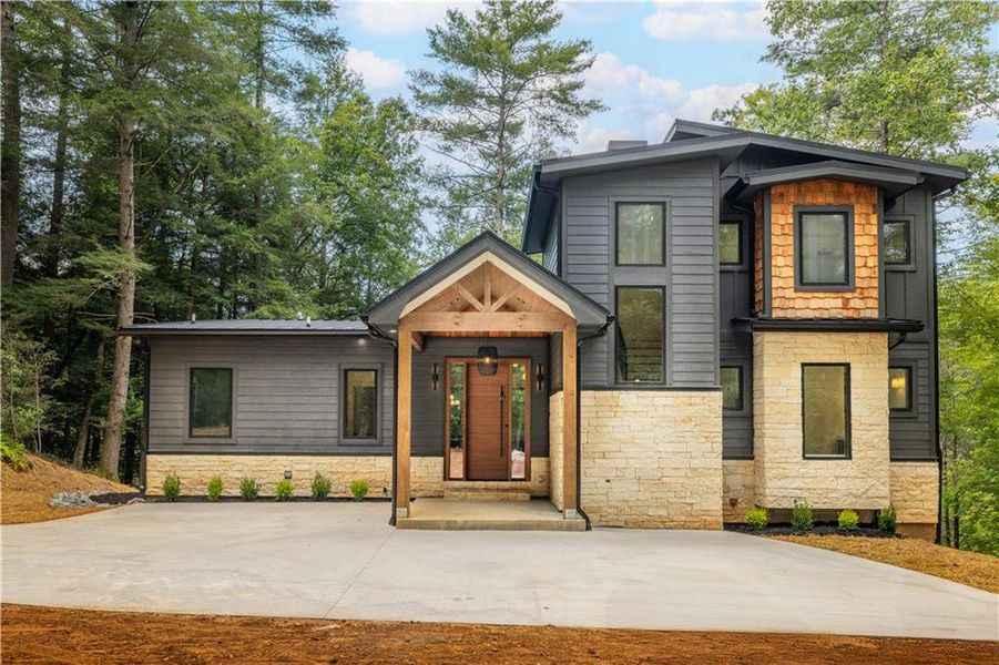 Front exterior of a new home in , Cherry Log, GA, highlighting curb appeal (Image 21).