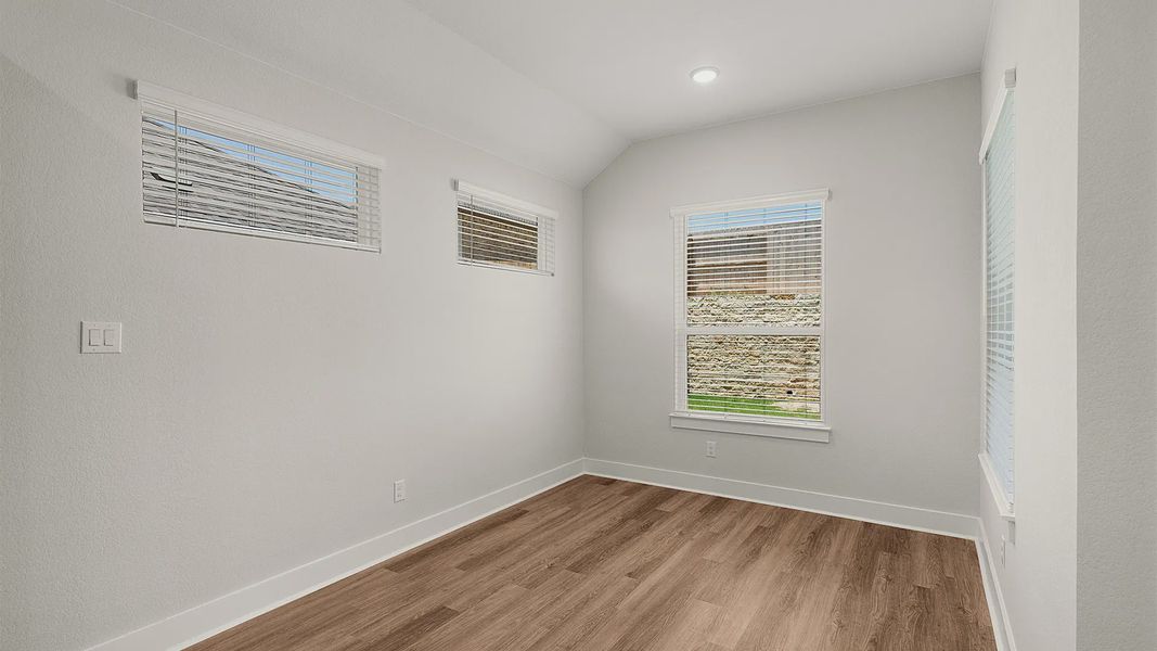 Representative unfurnished interior of a home built from the Brenner by Chesmar Homes in Newhaven, Manor (Image 36).