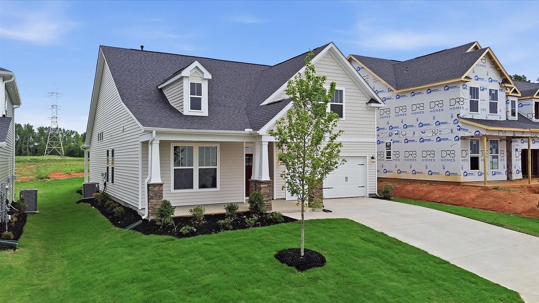 Front exterior of a new home in Fox Hollow, Spartanburg, SC, highlighting curb appeal (Image 20). Front exterior of a new home in Fox Hollow, Spartanburg, SC, highlighting curb appeal (Image 20).