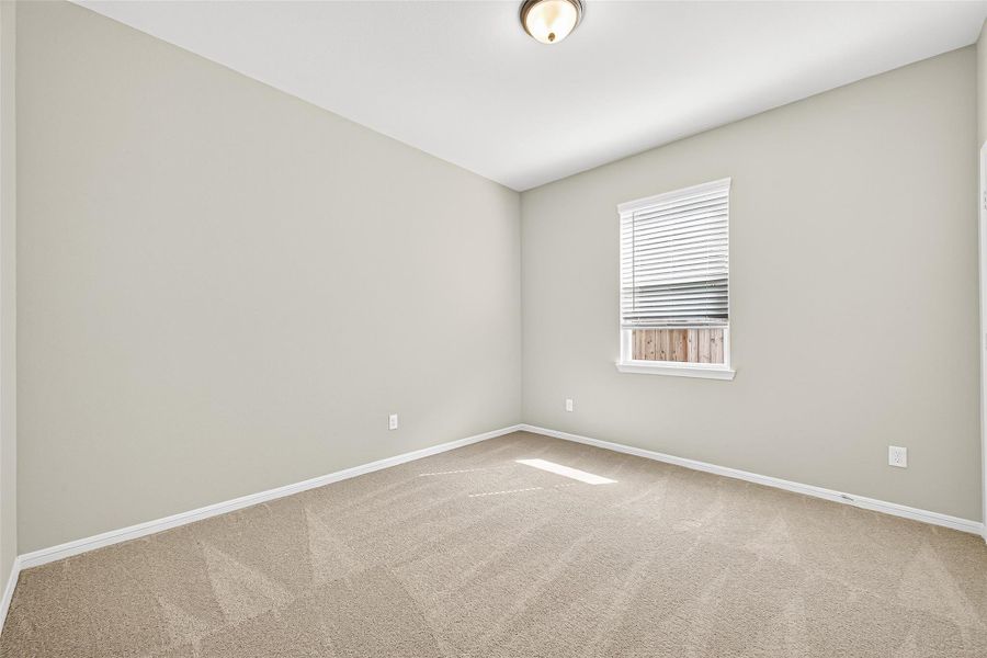 Spacious, unfurnished interior of a new home in Sunterra, Katy (Image 44).